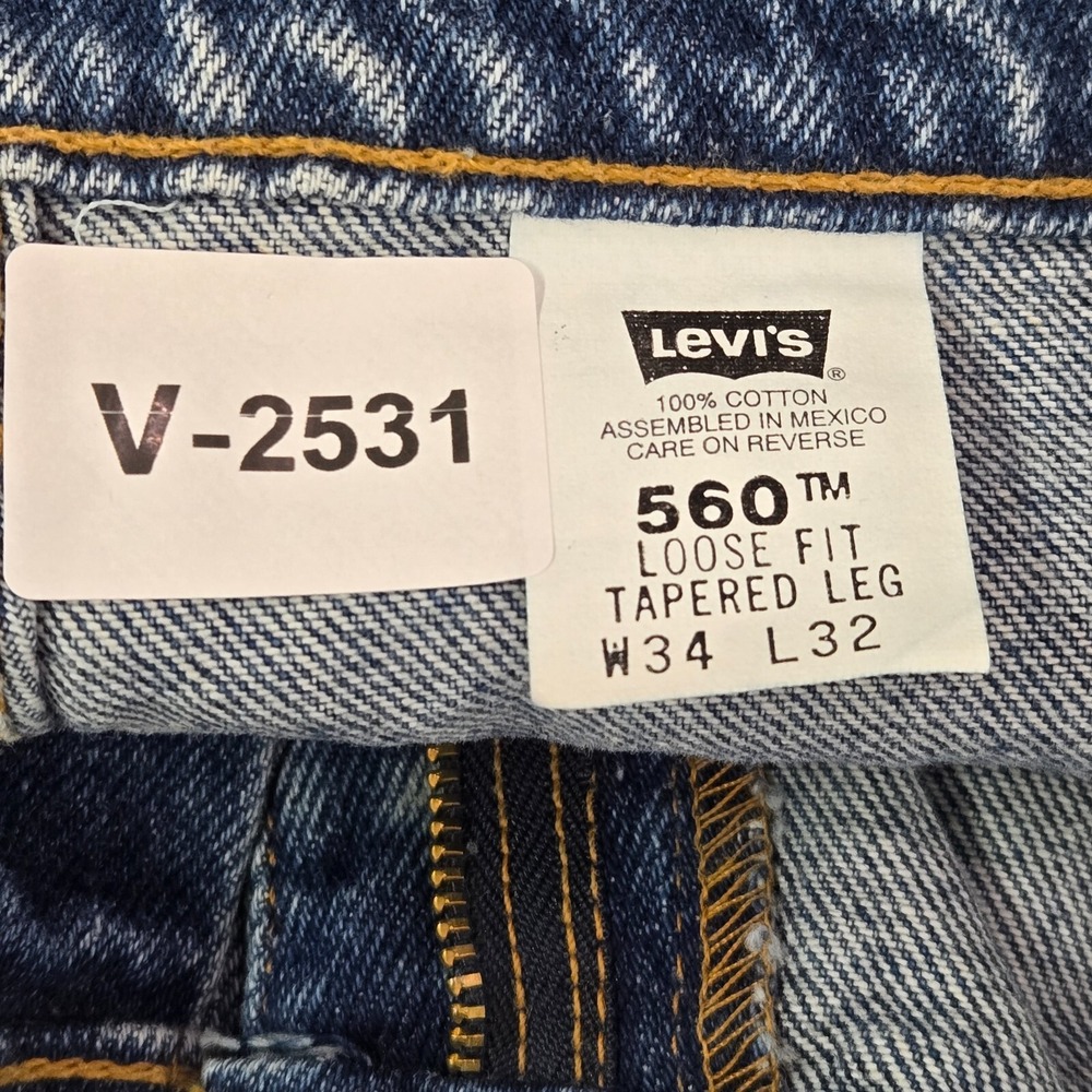 VINTAGE Levi's 560 Men Jeans 34x32 Blue 90s Denim Loose Fit Taper Deadstock NWT - Picture 2 of 12